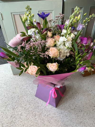 Pink radiance - Gorgeous scented Freesia, with spray roses, eustoma, iris and alstroemeria.