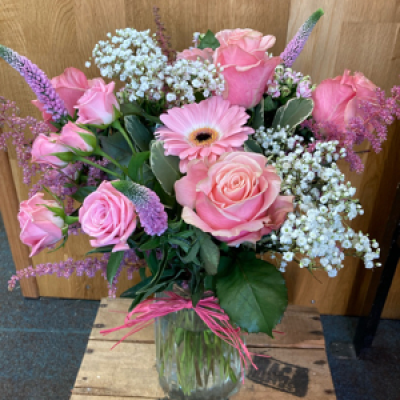 Pretty pink vase - Favourite vase arrangement using gerbera, roses, gypsophlia, Veronica and spray roses to create a very pretty design.