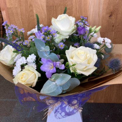 Lilac lace - Roses, aster, and lizianthus make this a Superb selection of purple white and lilac flowers.