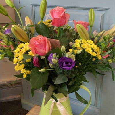 Sunny Meadow - A delightful jug arrangement. Includes a mix of pink, yellow and purple flowers with complimentary foliage. Hand delivered with care in and around Dereham by Bright and Beautiful.