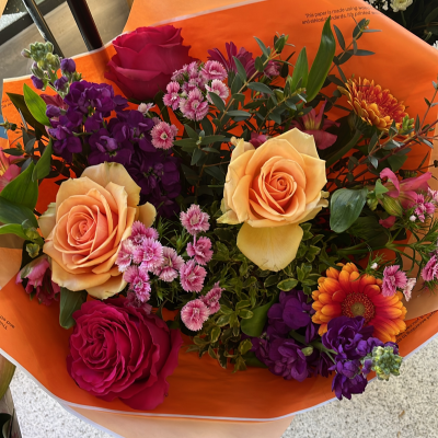 Bright new day - Lovely mix of incredible large bloom roses, scented stocks, and gerbera.